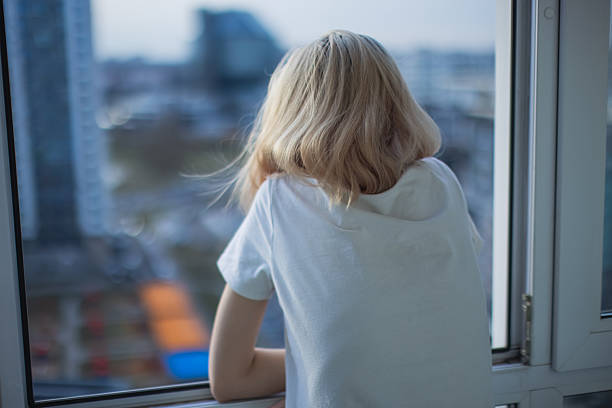 Young woman on balcony