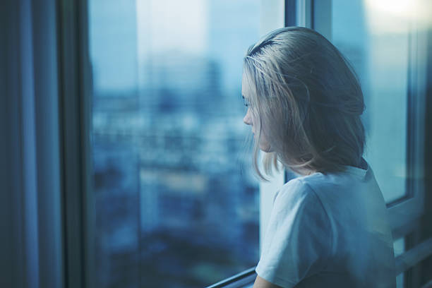 Young woman on balcony