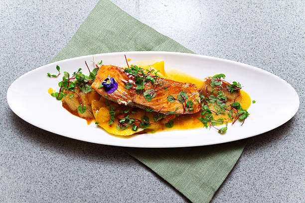 istock Plated gourmet salmon with mango sauce. 2214590453