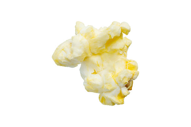 popcorn spilling from popcorn red and white container on white background.http://www.garyalvis.com/images/foodDrink.jpg