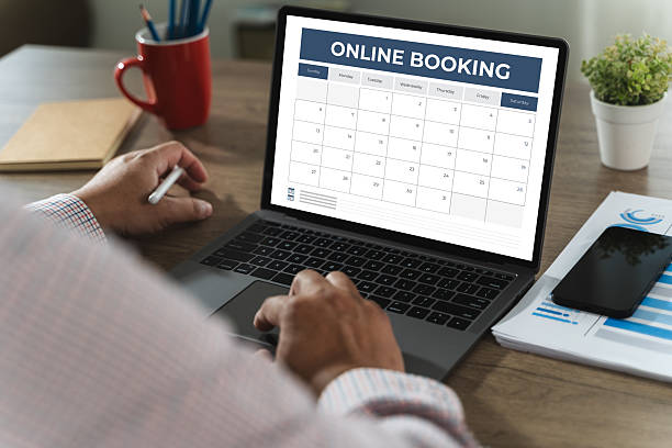 istock Booking Meeting Appointment Computer Online On digital tablet at office book appointment 2214595201