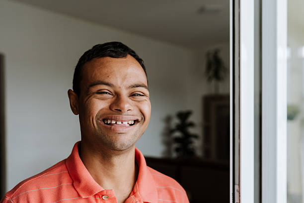 istock Inclusive portrait of man with Down syndrome 2214595367