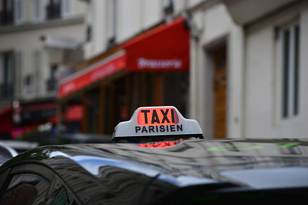 istock Taxi in Paris 2214595550
