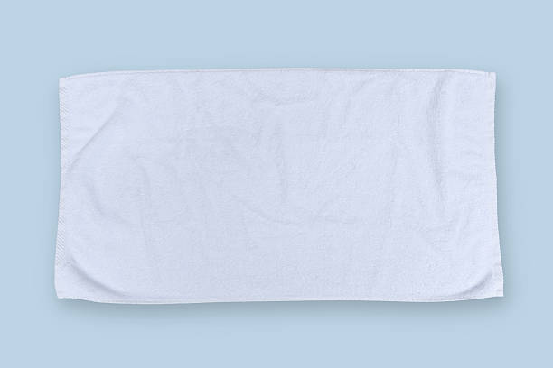 istock White towel mock up template cotton fabric cloth wiper mockup isolated on light pastel blue background with clipping path, flat lay top view for hand towel and face cloths template 2214595564