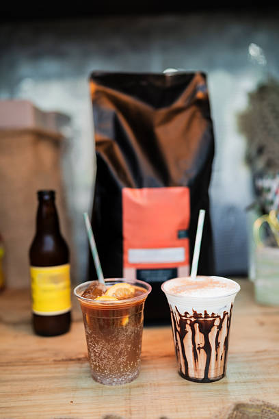 Refreshing iced coffee and creamy chocolate milkshake waiting to be enjoyed at a cozy coffee shop, perfect for quenching summer thirst