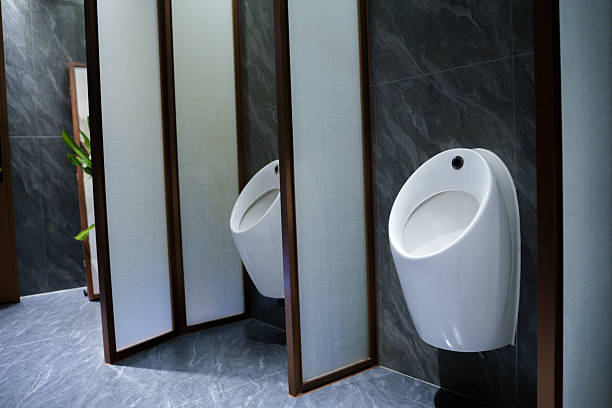 Clean and tidy urinal in men's public toilet