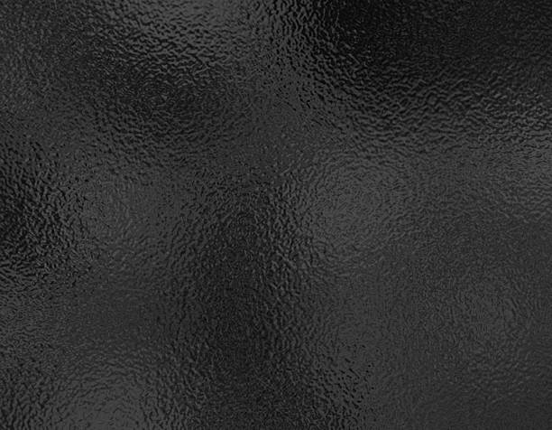 istock Black or dark foil glass texture background. Abstract gradient bright light reflection and shiny rough texture surface. Glass effect background 2214605929