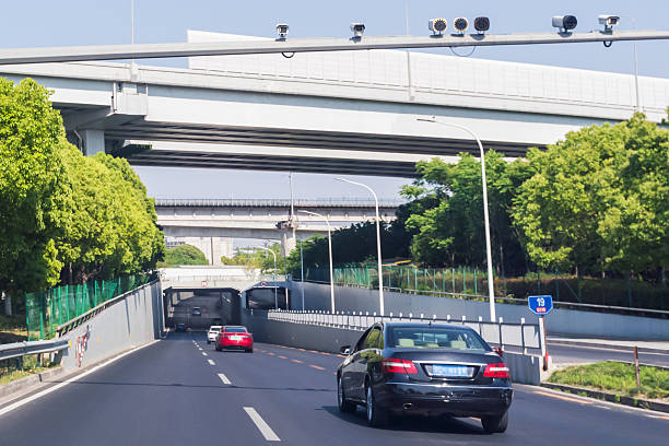 istock Multiple elevated roadways in Shanghai intersect, highlighting urban transport design and busy city life 2214612511