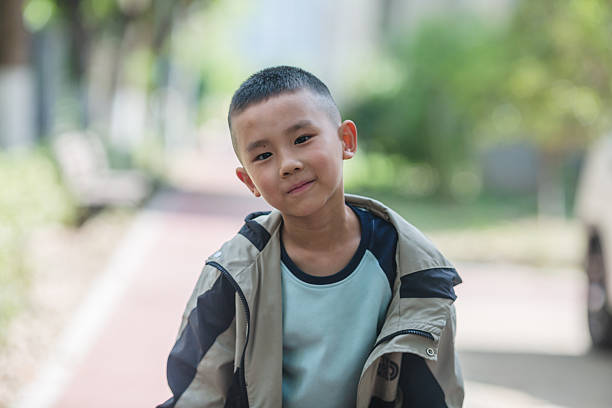 istock Cute child having fun in the nature. 2214616869