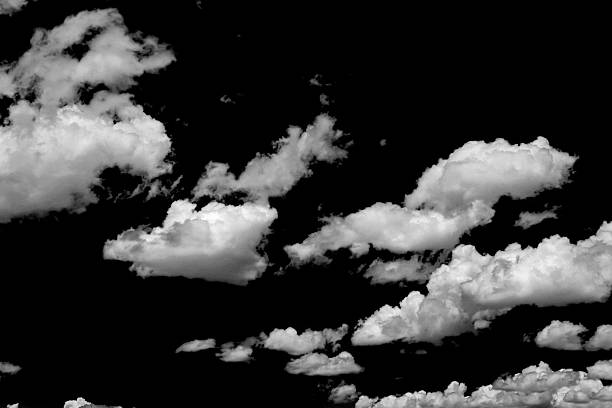 istock Fluffy white clouds isolated on black background. Design concept. Smog. Abstract clouds. Fog over the sky. Cloud or smog background 2214619698