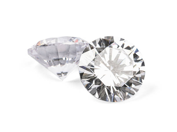 istock Two beautiful shiny diamonds isolated on white 2214620127