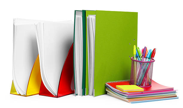 istock Bright office folders and different stationery isolated on white 2214620545