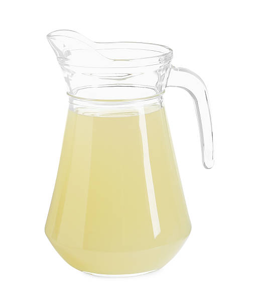istock Refreshing lemon juice in jug isolated on white 2214622053