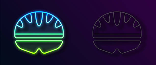 istock Glowing neon line Bicycle helmet icon isolated on black background. Extreme sport. Sport equipment. Vector 2214624971