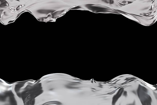 istock Dynamic chrome shapes flow gracefully across a black background, showcasing smooth contours and reflective surfaces. The design features ample copy space for text or branding 2214631325