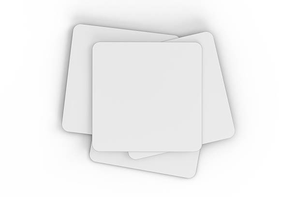 istock Square drink or beer coaster mockup set, isolated on background. Protection bierdeckel for beer glasses, bottle, can, cup holder. Empty bottle coaster lying template for beverage branding. 3d render 2214632846