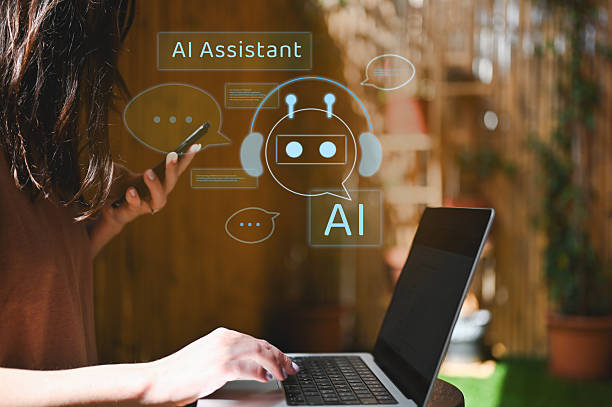 Woman using ai assistant on laptop and smartphone