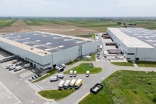 istock Logistics centers with solar panels on roofs. Aerial view. Drone point of view. 2214635232