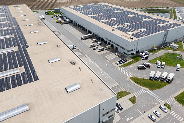 istock Logistics centers with solar panels on roofs. Aerial view. Drone point of view. 2214636318