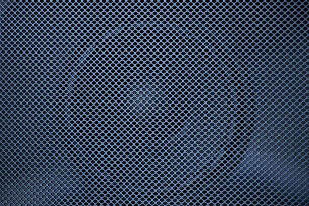 Black speaker mesh close-up, music speaker
