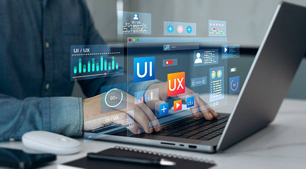 istock UX-UI design web and user design development. Holographic UI-UX, display icons of UX-UI designer, creative planning, data visualization. Web design, application design,coding develop. 2214640475