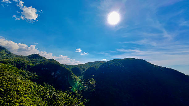 istock Mountain landscape with sun and clouds. 2214641079
