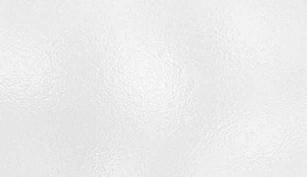 White gray foil glass texture background. Abstract gradient bright light reflection and shiny rough texture surface. Glass effect background