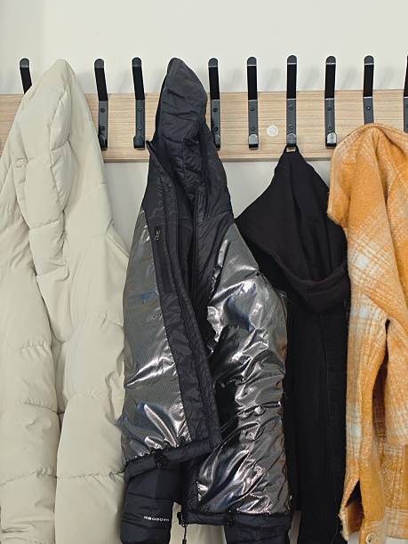 istock Coat hanger in school with coats in it 2214641648