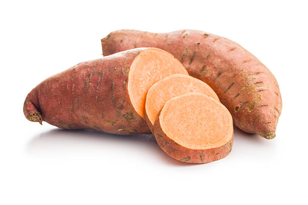 istock Raw sweet potatoes isolated on white background.. 2214643305