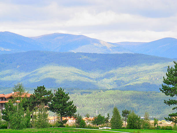 istock A green field with a golf course in the background 2214647422