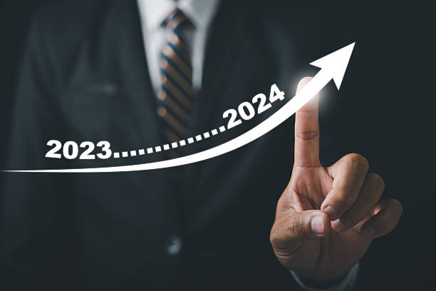 istock Businessman pointing arrow graph growth and financial network connection 2214650511