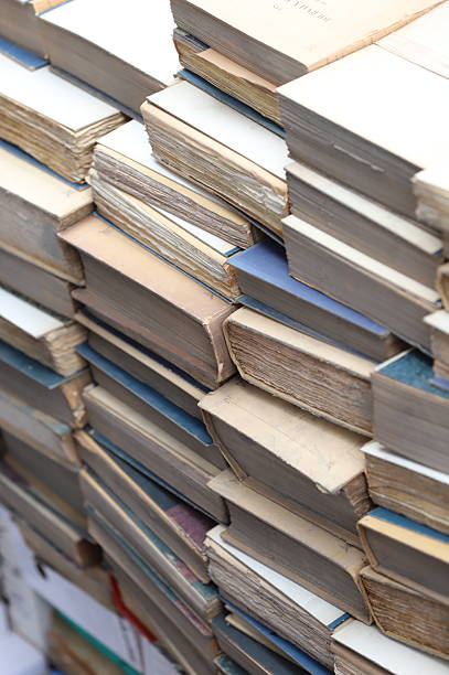 istock A pile of old books and documents, ready to be destroyed for recycling. 2214656235