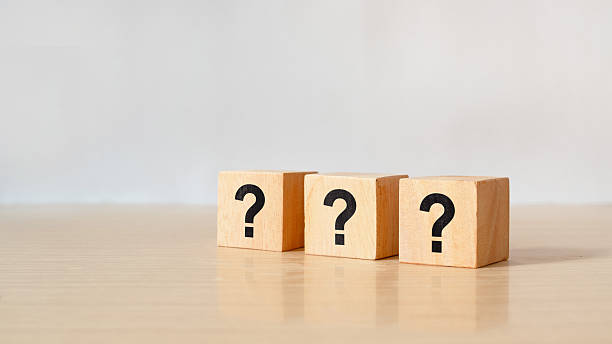 istock Question mark on wooden block 2214656617
