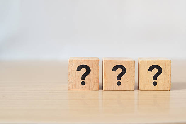 istock Confused or Thinking Concept  Wooden Cube Featuring a Question Mark Sign 2214656648