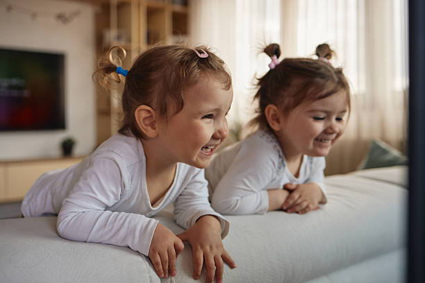 istock Beautiful smiling twin sisters 2214658485