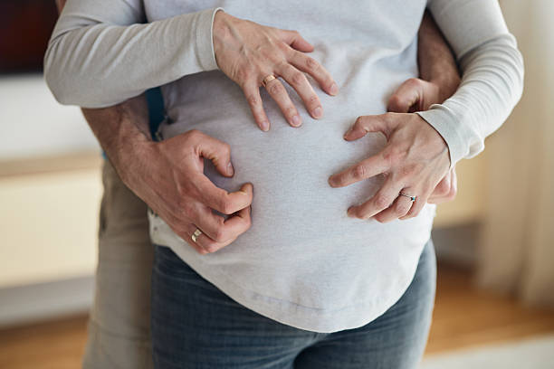 istock Need more hands for scratching my pregnant belly 2214658552