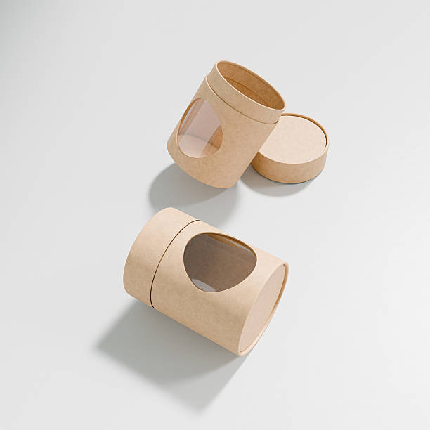 istock eco-freindly cylindrical paper packaging with clear window, brown craft paper gift box with window display, luxury corrugated paperboard packaging, small size kraft paper bottle tube mockup 2214659687