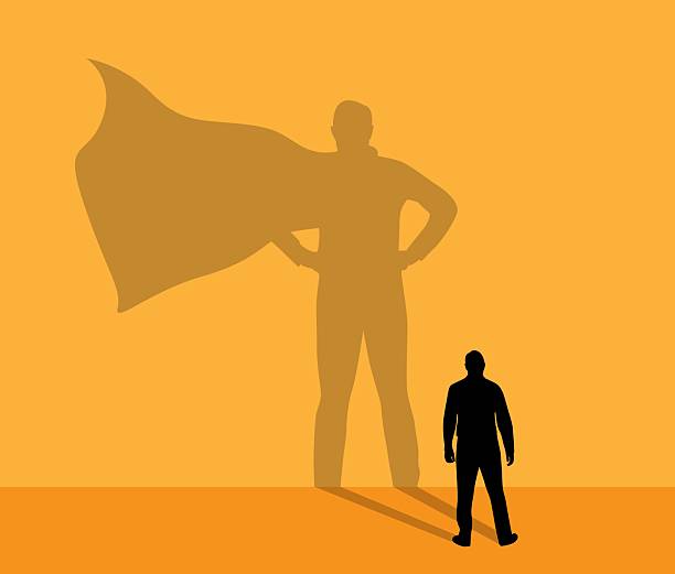 istock Silhouette of Business Man with Superhero Shadow Colorful Background 2214662928