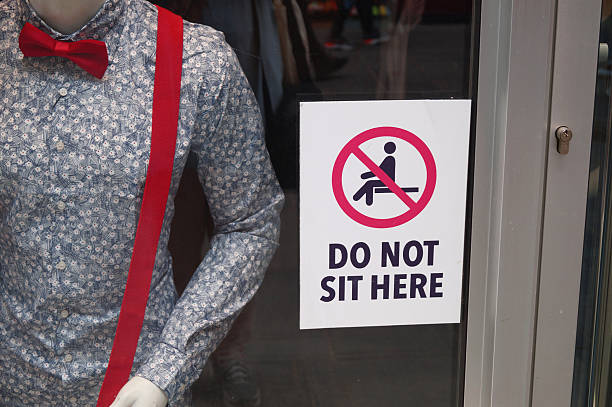 istock No sitting in front of the store sign 2214667907