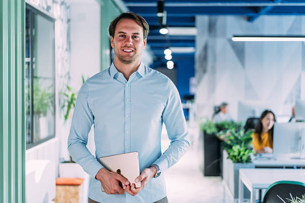 istock Successful businessman in the office. 2214670338