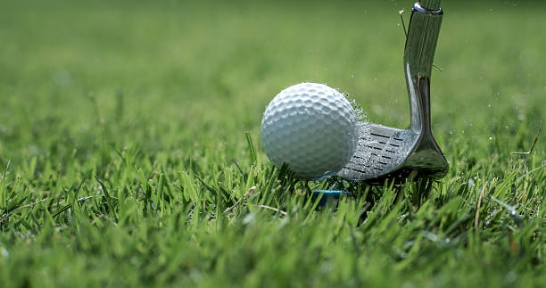 istock Golf club hits a golf ball. 2214670393
