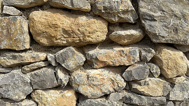 istock Natural stone wall made of large stones 2214675248