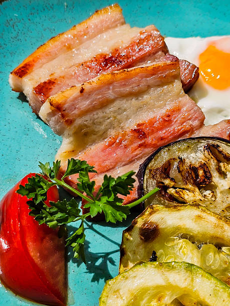 istock Traditional English Breakfast with Eggs, Bacon and Vegetables 2214679261