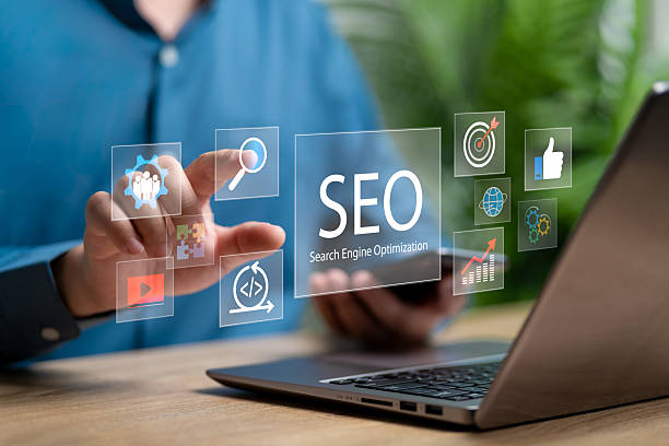 istock SEO, Search engine optimisation concept, Businessman touch on SEO icon, Business analysis, Automation AI and Digital marketing,  Promoting ranking traffic online and optimising website, Best Target 2214682517