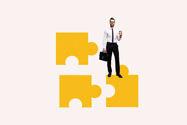 istock Creative collage young handsome man entrepreneur diligent employee manager suitcase puzzle game match fragments elements connection logic 2214685148