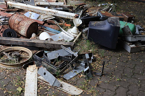 istock Pile of assorted scrap metal and old electronics in outdoor setting. 2214685268