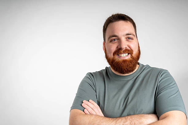 istock Hipster man in green t-shirt, studio shot, isolated 2214685588