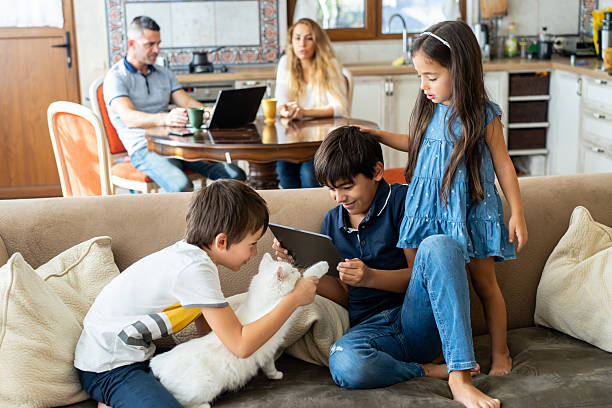istock Children playing in a living room 2214691839