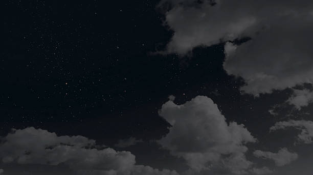 istock a moon moving in the night sky with stars and clouds 2214692649