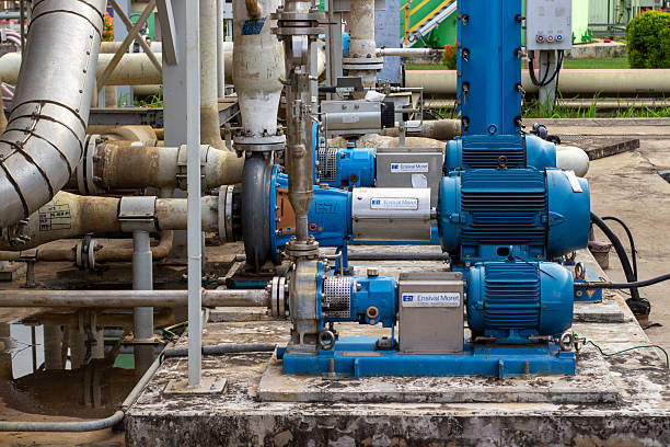 istock ndustrial blue demineral water pumps and piping system 2214693726